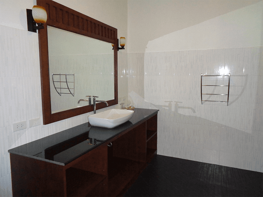 Modern bathroom with separate toilet in bungalow