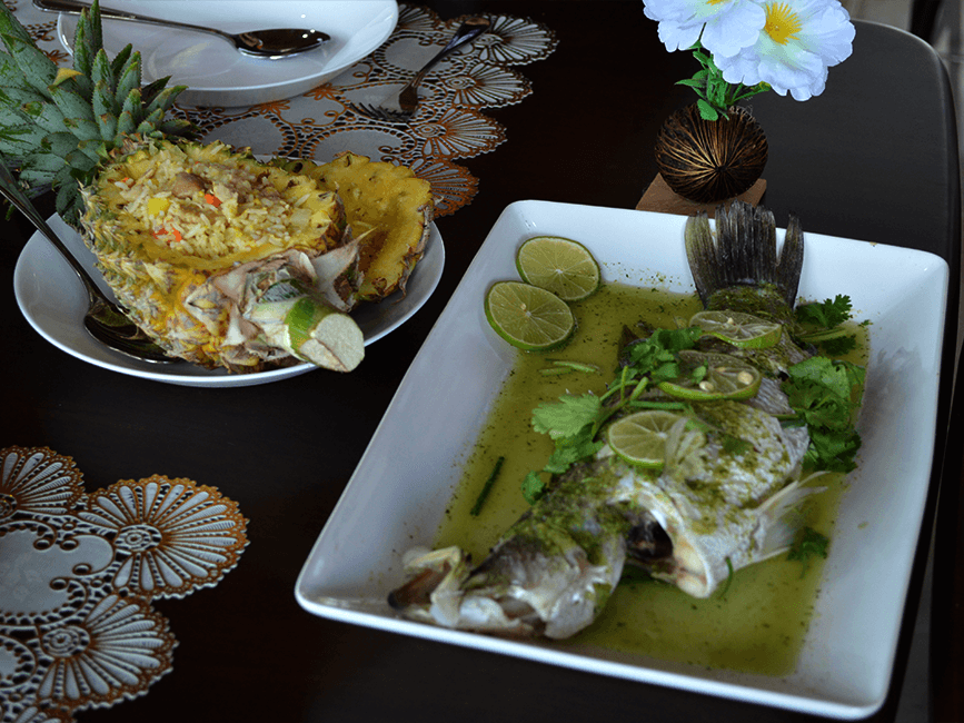 Open-air restaurant and bar at Paradis Vert with tropical ambiance