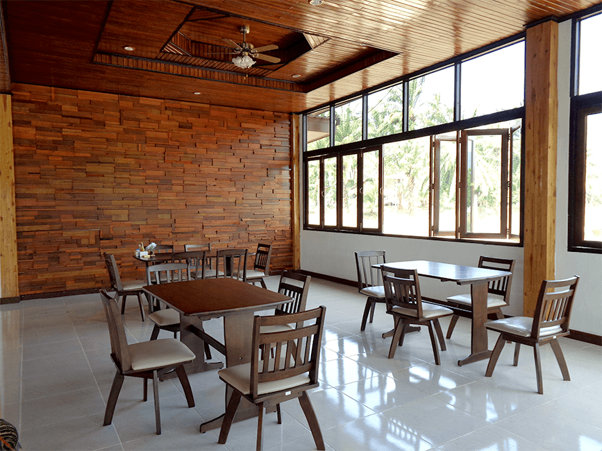 Restaurant seating area with garden views